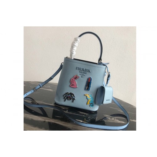 Prada 1BA217 Small Prada Panier bag with appliques in Light Blue Saffiano leather