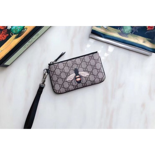 Gucci Bee print Supreme pouch