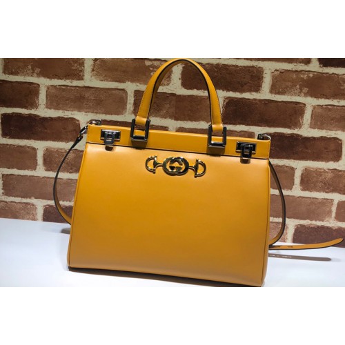 Gucci Zumi medium top handle bag in Yellow Leather