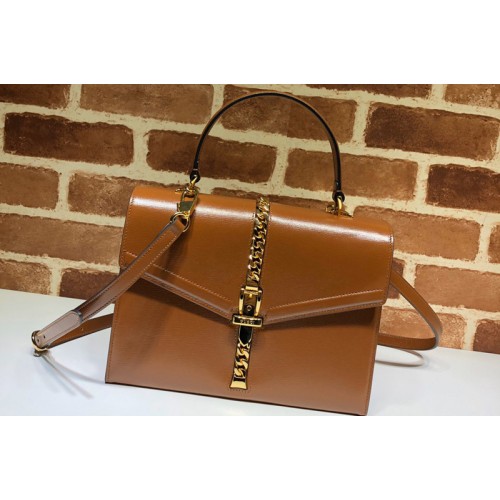 Gucci Sylvie 1969 small top handle bag in Brown textured leather