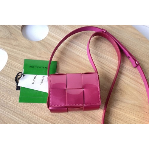 Bottega Veneta Cassette mini bag in Rose Intreccio leather