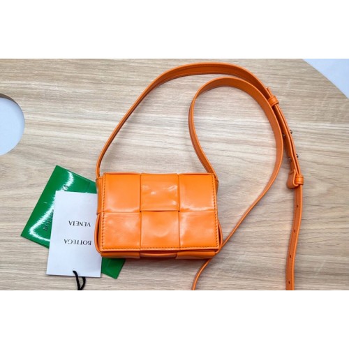 Bottega Veneta Cassette mini bag in Orange Intreccio leather