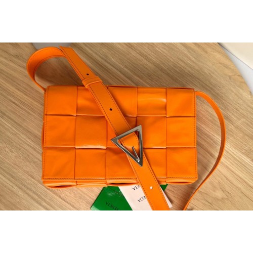 Bottega Veneta Cassette cross-body bag in Orange Intreccio leather