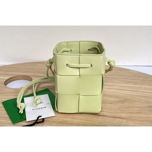 Bottega Veneta Cassette Mini intreccio leather cross-body bucket bag in Yellow Leather