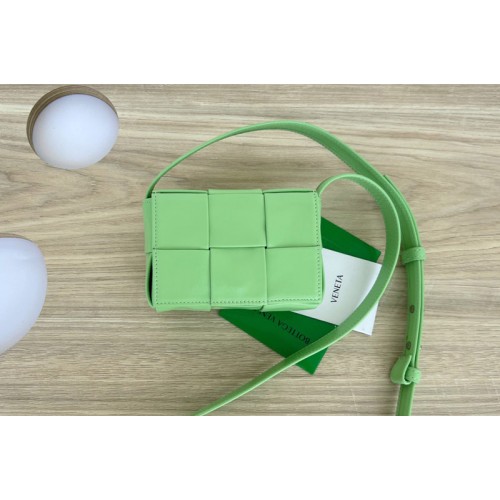 Bottega Veneta Cassette mini bag in Green Intreccio leather