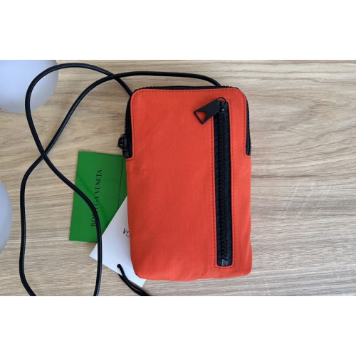 Bottega Veneta Phone Pouch in black leather and Red nylon