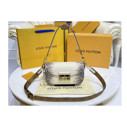 Louis Vuitton M20395 Swing handbag in Lizard Calfskin leather